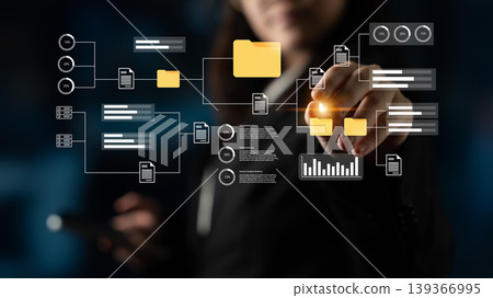 Business professional interacting with digital data visualization, using technology to organize information, analysis, and workflow management for productivity enhancement Gantry 139366995