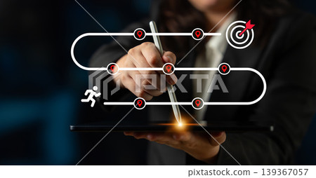 Business Professional Illustrating Success Journey with Target and Runner Icons on Digital Tablet for Growth and Achievement Concept Ledger Business Professional Illustrating Success Journey with Target and Runner Icons on Digital Tablet for Growth and Achievement Concept Ledger 139367057