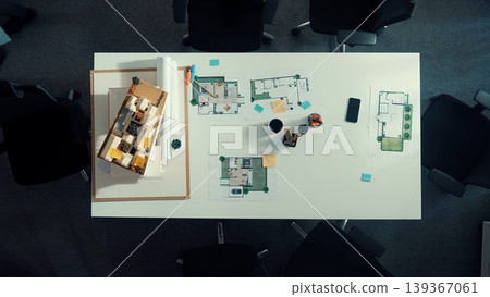 Top view of manager use laptop to analysis building construction. Alimentation. Top view of manager use laptop to analysis building construction. Alimentation. 139367061