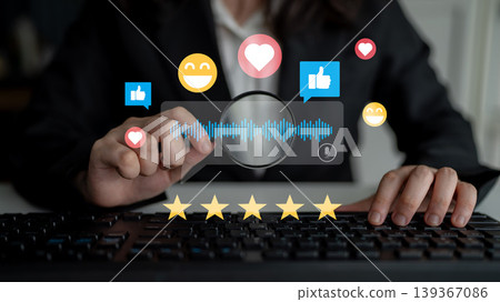 Business Professional Engaged in Digital Interaction with Social Media Icons and User Feedback on Keyboard Ledger Business Professional Engaged in Digital Interaction with Social Media Icons and User Feedback on Keyboard Ledger 139367086