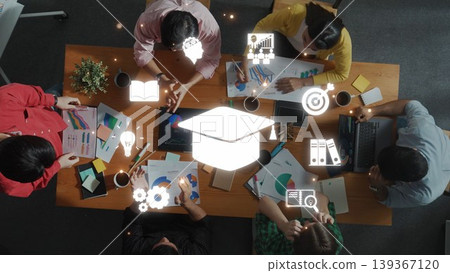 Business Professionals Collaborating on Data Analysis with Digital Icons Representing Learning, Innovation, and Strategy in Modern Office Setting. Raster Business Professionals Collaborating on Data Analysis with Digital Icons Representing Learning, Innovation, and Strategy in Modern Office Setting. Raster 139367120