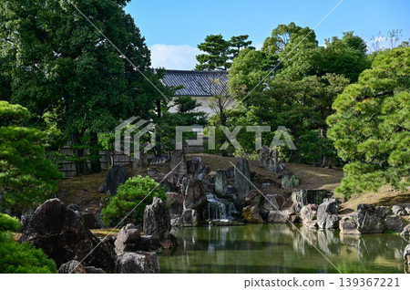 The Japanese gardern view of nijo jo castle, Kyoto, Japan. World Heritage Site, Japanese old traditional architecture in Kyoto, Japan. Background landscape of the beauty of Nijo Castle at sunny day. 139367221