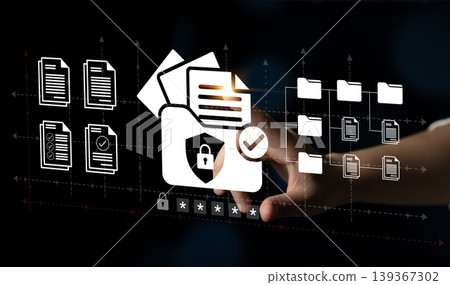 Hand Interacting with Digital Security Icons and Files, Representing Data Protection and Secure Information Management in a Modern Workspace Ledger Hand Interacting with Digital Security Icons and Files, Representing Data Protection and Secure Information Management in a Modern Workspace Ledger 139367302