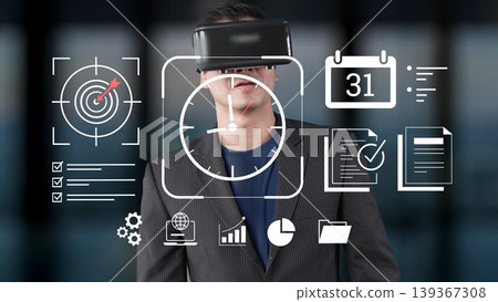 Businessman Using Virtual Reality Headset with Various Business Icons Representing Analytics, Goals, and Planning in Modern Office Environment Gluon Businessman Using Virtual Reality Headset with Various Business Icons Representing Analytics, Goals, and Planning in Modern Office Environment Gluon 139367308