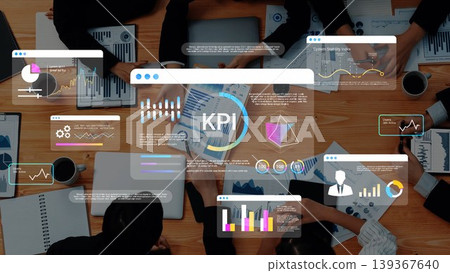 Teams Collaborating on Key Performance Indicators with Graphs, Charts, and Laptops in a Modern Office Environment Gluon 139367640