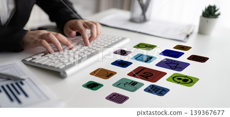 Business Professional Working at Desk with Marketing Icons and Digital Tools Illustrating Online Advertising and E-Commerce Development Concepts Fluxor 139367677