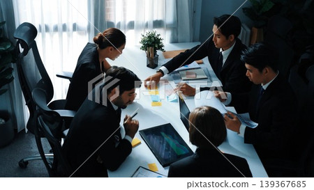 Top view of business people looking at financial chart from tablet. Directorate. 139367685