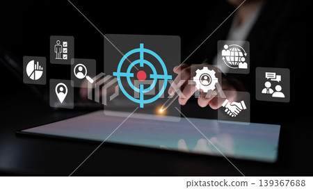 Hands Using Touchscreen Device with Interface Overlays Representing Targeting, Data Analysis, Collaboration, and Global Communication Ledger Hands Using Touchscreen Device with Interface Overlays Representing Targeting, Data Analysis, Collaboration, and Global Communication Ledger 139367688