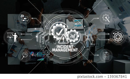 Visual representation of incident management in an office setting, showcasing teamwork and technology to enhance efficiency and problem-solving processes in business. Sigmoid Visual representation of incident management in an office setting, showcasing teamwork and technology to enhance efficiency and problem-solving processes in business. Sigmoid 139367841
