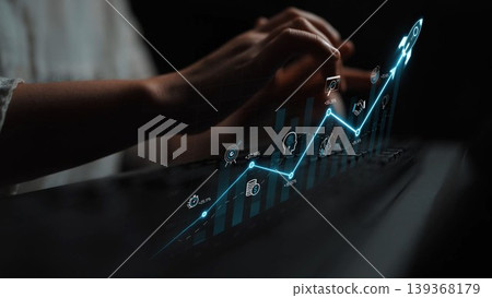 Hands typing on a laptop with a digital growth chart, showcasing analysis and strategy in finance. Perfect for themes of business success and innovation in marketing. Sigmoid Hands typing on a laptop with a digital growth chart, showcasing analysis and strategy in finance. Perfect for themes of business success and innovation in marketing. Sigmoid 139368179