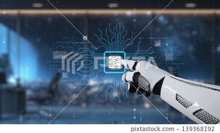 Futuristic robotic hand interacting with holographic microchip technology in an advanced digital workspace environment. Auvana Futuristic robotic hand interacting with holographic microchip technology in an advanced digital workspace environment. Auvana 139368192