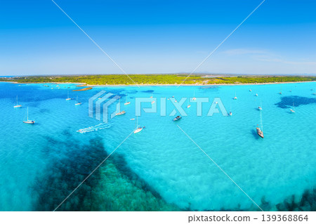 Aerial view of yachts and boats anchored in azure bay with crystal clear water on coast of Mallorca 139368864
