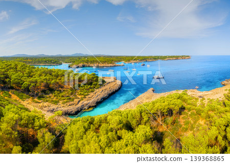 Aerial view of yachts and boats on the Mallorca, Balearic Islands, Spain. Scene from a drone. Aerial view of yachts and boats on the Mallorca, Balearic Islands, Spain. Scene from a drone. 139368865