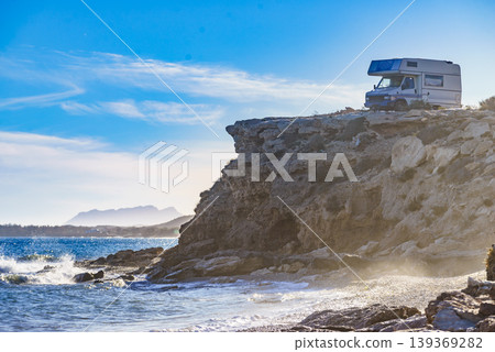 Camper vehicle capming on coast cliff, region of Mazarron in Murcia Spain. Camper vehicle capming on coast cliff, region of Mazarron in Murcia Spain. 139369282