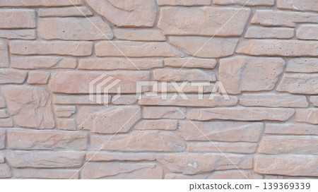 Brown brick background with holes. 139369339