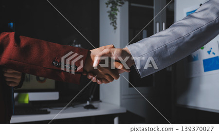 Business people shaking hands closing a deal Business people shaking hands closing a deal 139370027