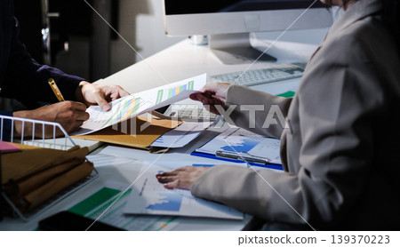 Business woman accountant working in office checking financial accounts and allocating company budgets. Business woman accountant working in office checking financial accounts and allocating company budgets. 139370223