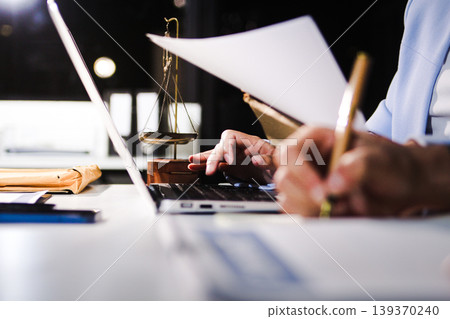 Consultation and conference of professional businesswoman and Male lawyers working and discussion having at law firm in office. Concepts of law, Judge gavel with scales of justice Consultation and conference of professional businesswoman and Male lawyers working and discussion having at law firm in office. Concepts of law, Judge gavel with scales of justice 139370240