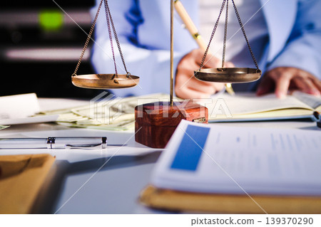 Consultation and conference of professional businesswoman and Male lawyers working and discussion having at law firm in office. Concepts of law, Judge gavel with scales of justice 139370290