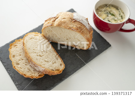 Sliced country bread and soup Sliced country bread and soup 139371317