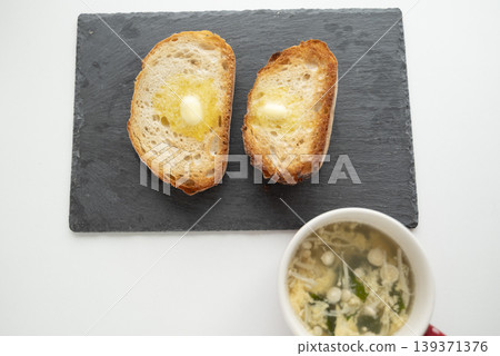 Toasted country bread and cup soup 139371376