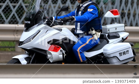 Image of a police motorcycle on patrol Image of a police motorcycle on patrol 139371409