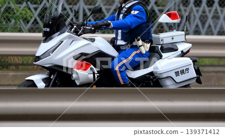 Image of a police motorcycle on patrol Image of a police motorcycle on patrol 139371412