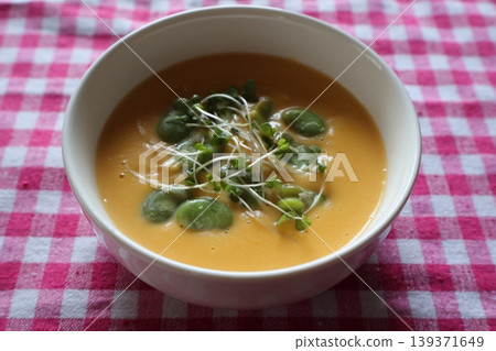 Carrot and potato potage with broad beans Carrot and potato potage with broad beans 139371649