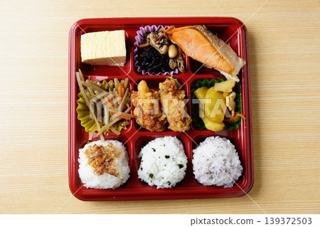 Salmon and fried chicken bento box Salmon and fried chicken bento box 139372503