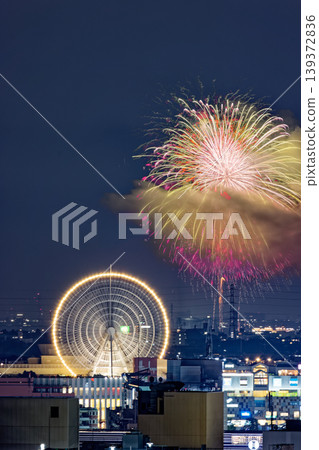 The Ferris wheel and fireworks in Kohoku New Town The Ferris wheel and fireworks in Kohoku New Town 139372836
