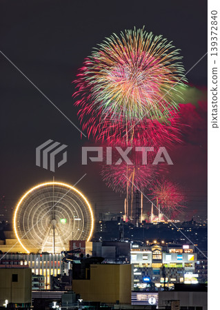 The Ferris wheel and fireworks in Kohoku New Town 139372840