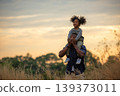 Happy African family child daughter riding the neck father 139373011