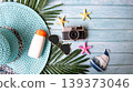 Summer Fashion woman big hat and sunblock with accessories item, vintage camera go to travel 139373046