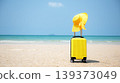 Summer travel and planing with yellow suitcase luggage in the sand beach. Travel in the holiday trips, 139373049