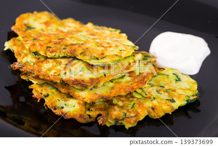 Image of pancakes from courgettes Image of pancakes from courgettes 139373699