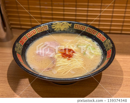 Authentic tonkotsu ramen topped with a secret sauce, served at the counter seats. 2026.04.20 Yokohama City, Japan Authentic tonkotsu ramen topped with a secret sauce, served at the counter seats. 2026.04.20 Yokohama City, Japan 139374348