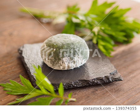 Mugwort rice cake (Yomogi mochi) - A traditional Japanese spring sweet. Mugwort rice cake (Yomogi mochi) - A traditional Japanese spring sweet. 139374355