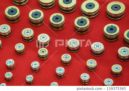 Various sizes of brass cooling circuit plugs for plastic injection mold maintenance and assembly. Various sizes of brass cooling circuit plugs for plastic injection mold maintenance and assembly. 139375365