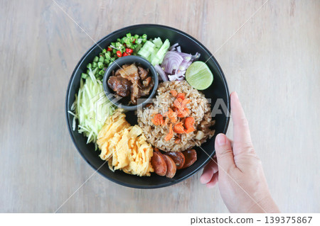 shrimp paste rice, fried rice or stir fried rice with egg and vegetable or Thai shrimp paste fried rice or rice mixed with shrimp paste 139375867