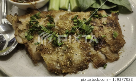 Delicious Thai Grilled Pork Neck with Spicy Dipping Sauce and Fresh Vegetables Delicious Thai Grilled Pork Neck with Spicy Dipping Sauce and Fresh Vegetables 139377028