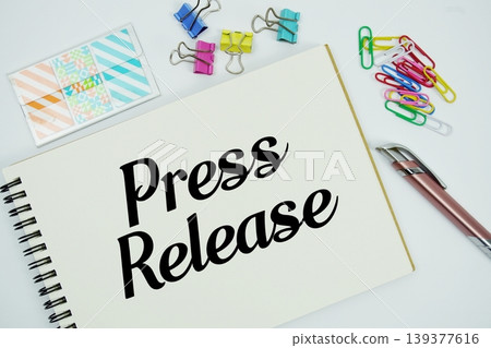 Press Release text message written on notepad with stationery flat lay on white background Press Release text message written on notepad with stationery flat lay on white background 139377616