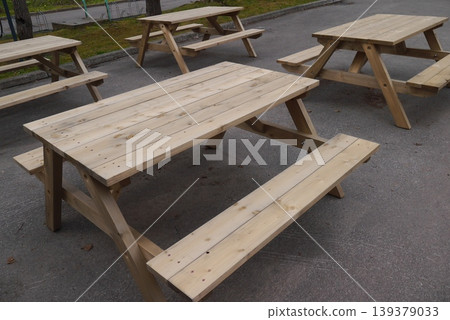 Table with benches placed outdoors 139379033