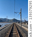 Railway infrastructure and roads under a blue sky 139379295