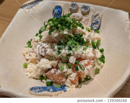 White sesame dressing with green onions and salmon White sesame dressing with green onions and salmon 139380288