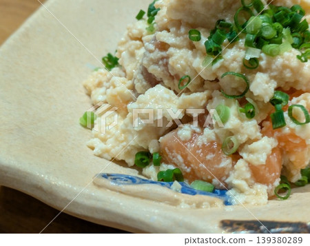 Salmon and green onion salad with tofu dressing Salmon and green onion salad with tofu dressing 139380289