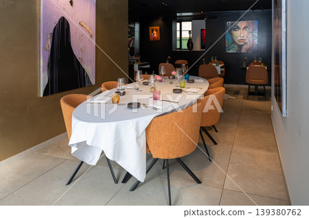 Refined chef table with artful decor. Exclusive tasting in stylish contemporary restaurant environment 139380762