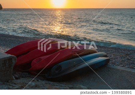 Boats and Beach of Etretat at Sunset 139380891