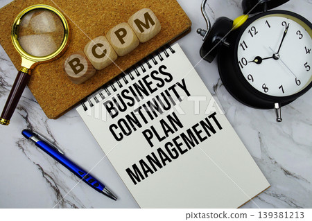 BCPM Business Continuity Plan Management text written on notepad with calculator and magnifying glass on marble background BCPM Business Continuity Plan Management text written on notepad with calculator and magnifying glass on marble background 139381213