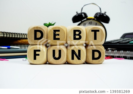 Debt Fund alphabet letters with calculator and alarm clock on white background Debt Fund alphabet letters with calculator and alarm clock on white background 139381269