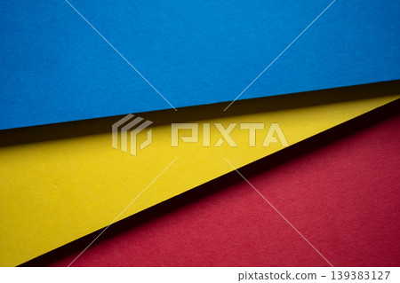 yellow, blue, and red construction paper background yellow, blue, and red construction paper background 139383127